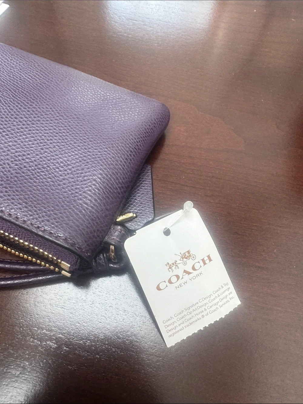 Coach clutch wristlet